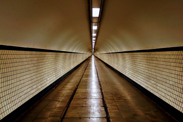 How can you explore the hidden underground tunnels of Liverpool during a guided tour?
